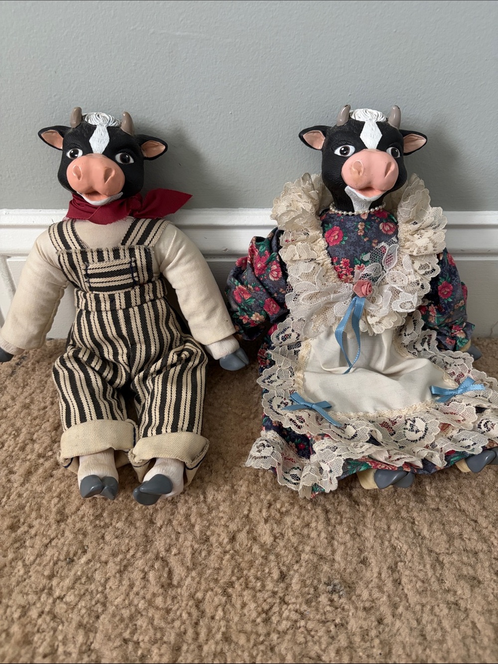 Vintage cow couple in folk art clothing